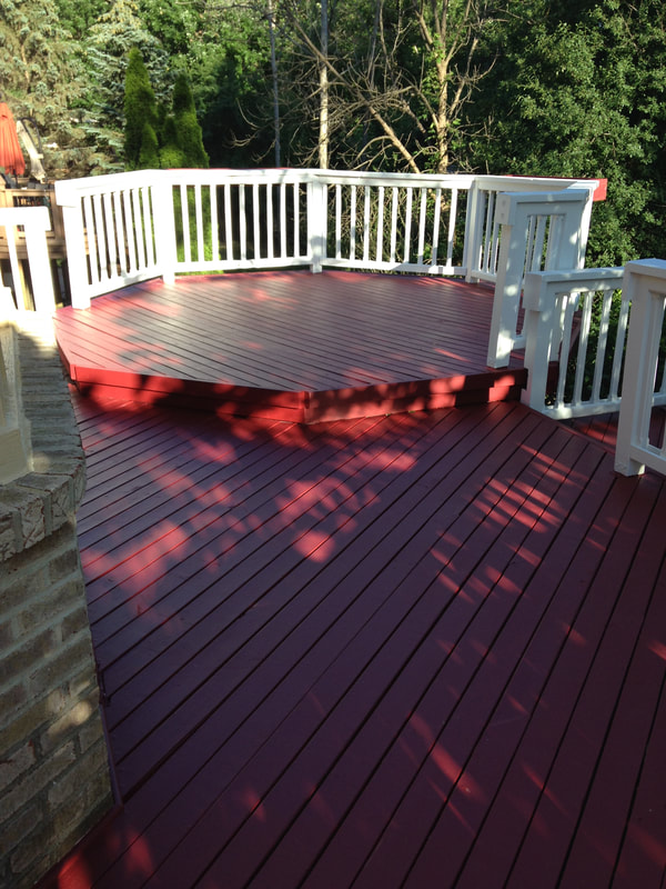 The painter replaced all the boards on deck which was very large flat decking with a hexagonal shape section of deck and applied fresh coat of deck and floor paint in red and painted the rails white. Beautiful job.